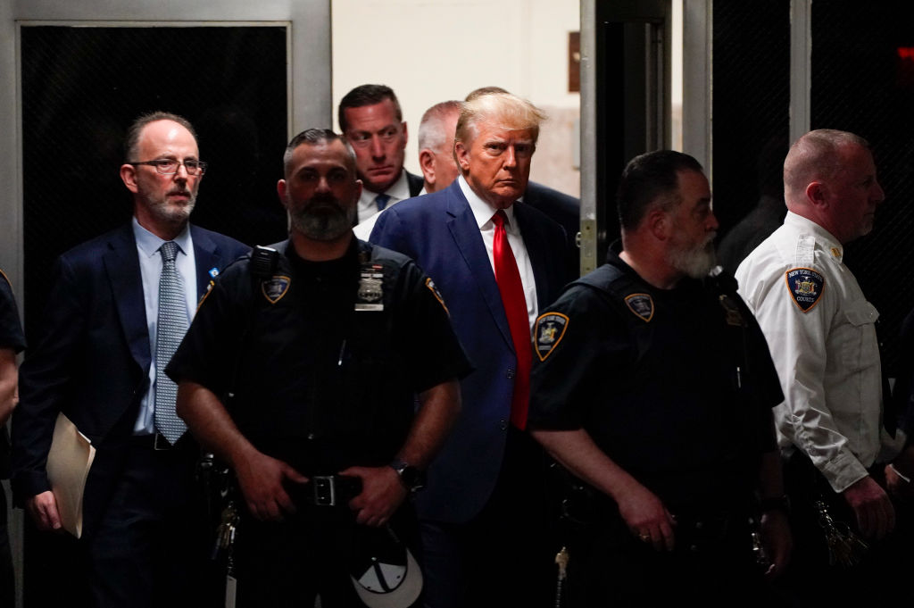 Donald Trump surrenders