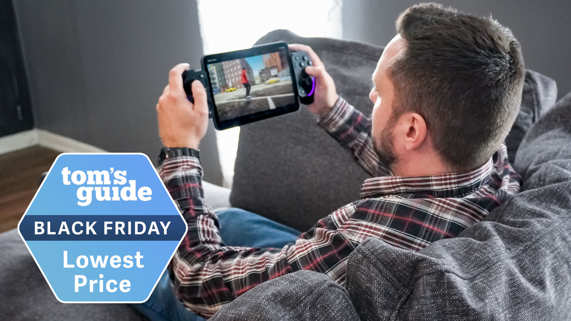 A person playing on an iPad mini with a Razer Kishi Ultra controller with a Tom's Guide Black Friday deals badge