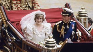 Prince Charles, Prince of Wales and Diana, Princess of Wales, wearing a wedding dress designed by David and Elizabeth Emanuel and the Spencer family Tiara, ride in an open carriage, from St. Paul's Cathedral to Buckingham Palace, following their wedding on July 29, 1981 in London, England