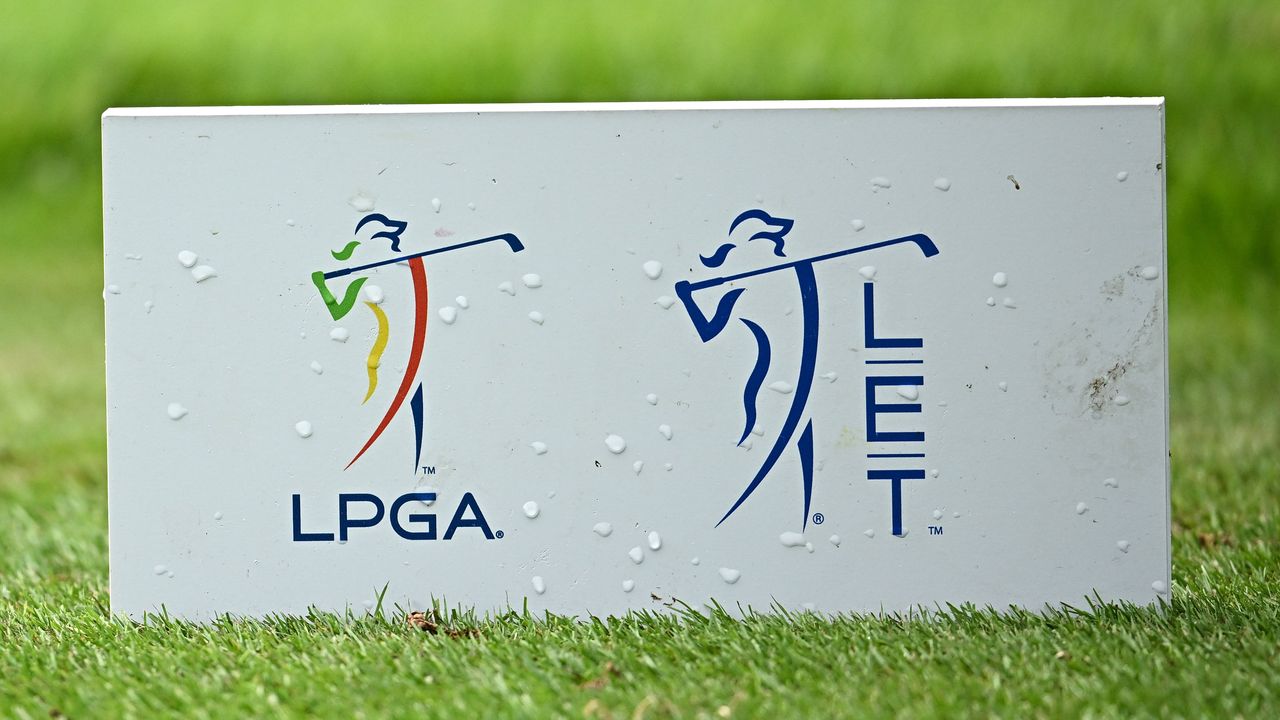 A tee marker with the LPGA Tour and LET logo on