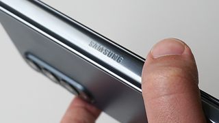 Samsung Galaxy Z Fold 4 logo handheld closeup