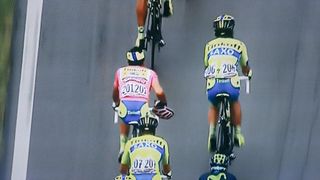 Alberto Contador removes his helmet during the Giro