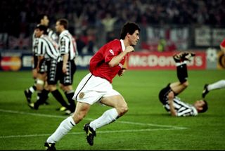 Roy Keane celebrates after scoring for Manchester United against Juventus in the teams' Champions League semi-final second leg in Turin in April 1999.