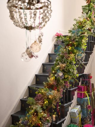 Colourful Christmas stair garland decorations by Wayfair