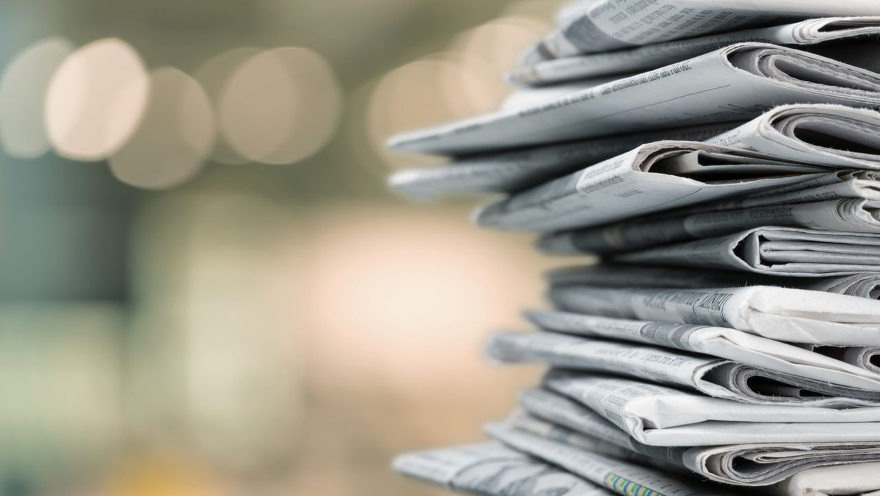 A stack of newspapers.