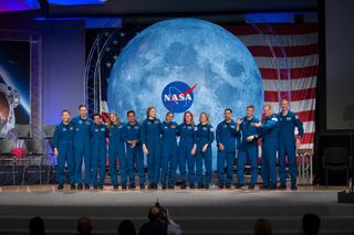 NASA's 2017 Class of Astronauts participate in graduation ceremonies at the Johnson Space Center in Houston, Texas, on Jan. 10, 2020. From left are, NASA astronaut Jonny Kim, Canadian Space Agency (CSA) astronaut Joshua Kutryk, NASA astronaut Jessica Watkins, CSA astronaut Jennifer Sidey-Gibbon, NASA astronauts Frank Rubio, Kayla Barron, Jasmin Moghbeli, Loral O'Hara, Zena Cardman, Raja Chari, Matthew Dominick, Bob Hines and Warren Hoburg. This is the first class to graduate under the Artemis program, and the 13 astronauts are now eligible for assignments to the International Space Station, Artemis missions to the Moon, and ultimately, missions to Mars.