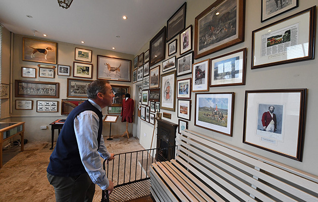 John checks out the paintings in the Duke’s Room — a piece of foxhunting history