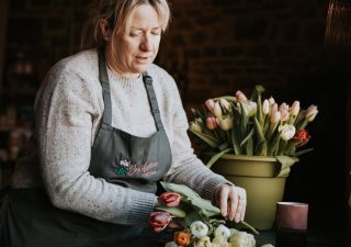 Alison Walker arranging flowers