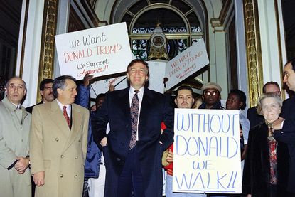 Donald Trump stands in front of the Plaza Hotel in 1994