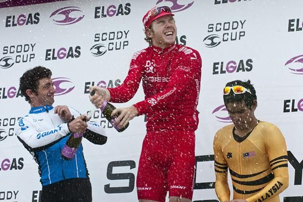 Stage nine celebrations (l-r): Rico Rogers (2nd,Swan Hill Rural City Council), Thomas Palmer (1st,Drapac Porsche) and Harrif Saleh (3rd,Malaysian National Team).