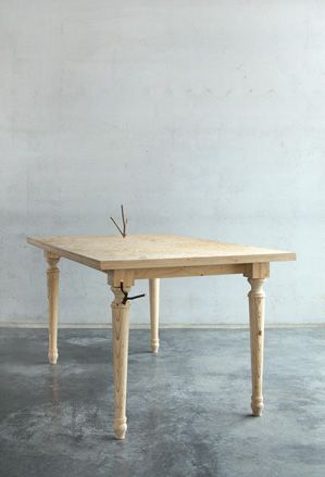 A four legged wooden table.