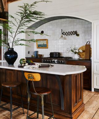 modern rustic kitchen with large tiled area and vintage wall sconces