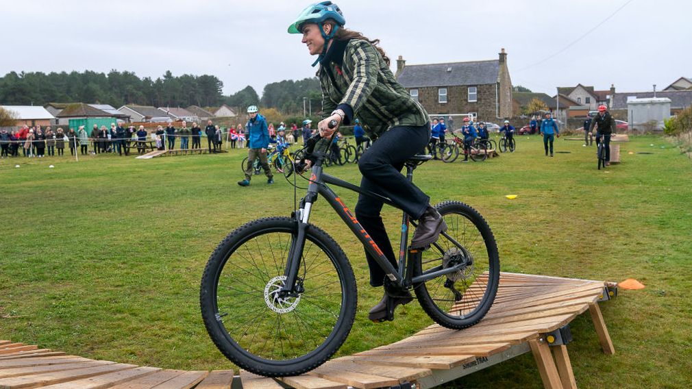 Princess Kate Middleton riding a mountain bike