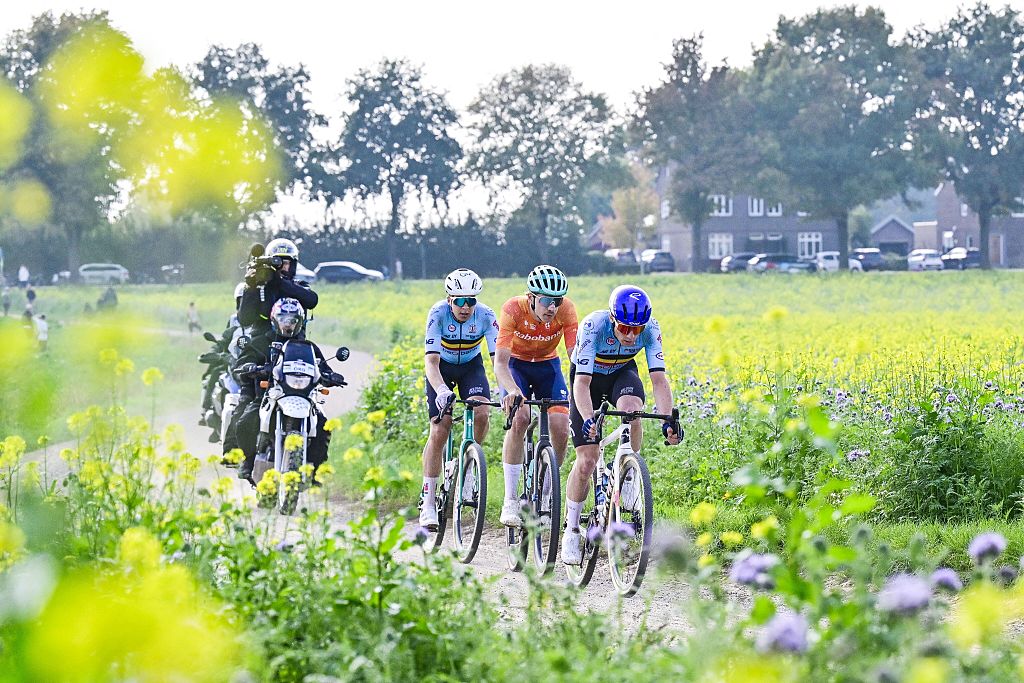 Belgian Florian Vermeersch, Dutch Frits Biesterbos and Belgian Floris Van Tricht pictured in action during the men elite race at the UCI World Gravel Championships, Sunday 12 October 2025, in Maastricht, The Netherlands. BELGA PHOTO DIRK WAEM (Photo by DIRK WAEM / BELGA MAG / Belga via AFP)