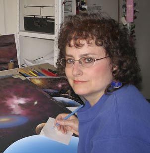 A shot of space artist Lynette Cook at the drawing table.