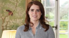 Princess Eugenie of York smiles as she attends a reception and panel discussion on the fashion industry's commitment to sustainability