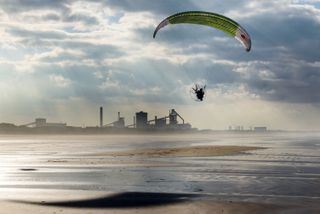 TV tonight Sacha Dench flying her electric paramotor above Redcar beach.