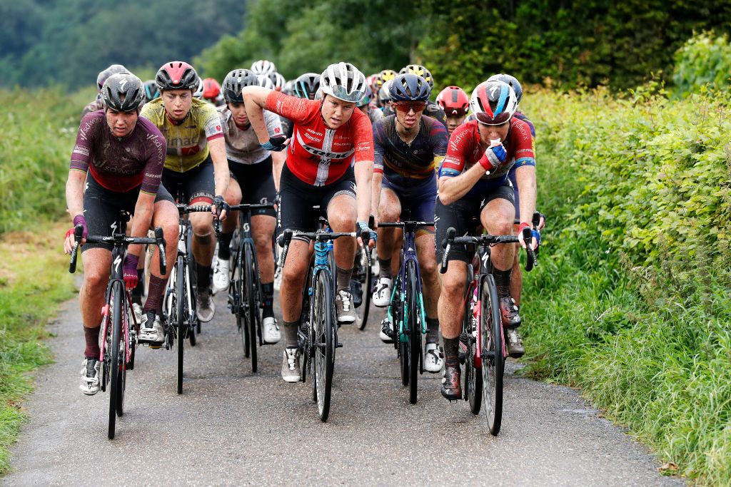 SWEIKHUIZEN NETHERLANDS AUGUST 28 LR Chantal Van Den Broek Blaak of Netherlands and Team SD Worx Marlen Reusser of Switzerland and Ale Btc Ljubljana Team yellow leader jersey Amalie Dideriksen of Denmark and Team Trek Segafredo Katarzyna Niewiadoma of Poland and Team Canyon SRAM Racing and Amy Pieters of Netherlands and Team SD Worx compete during the 23rd Simac Ladies Tour 2021 Stage 4 a 1489km stage from Geleen to Sweikhuizen SLT2021 UCIWWT on August 28 2021 in Sweikhuizen Netherlands Photo by Bas CzerwinskiGetty Images