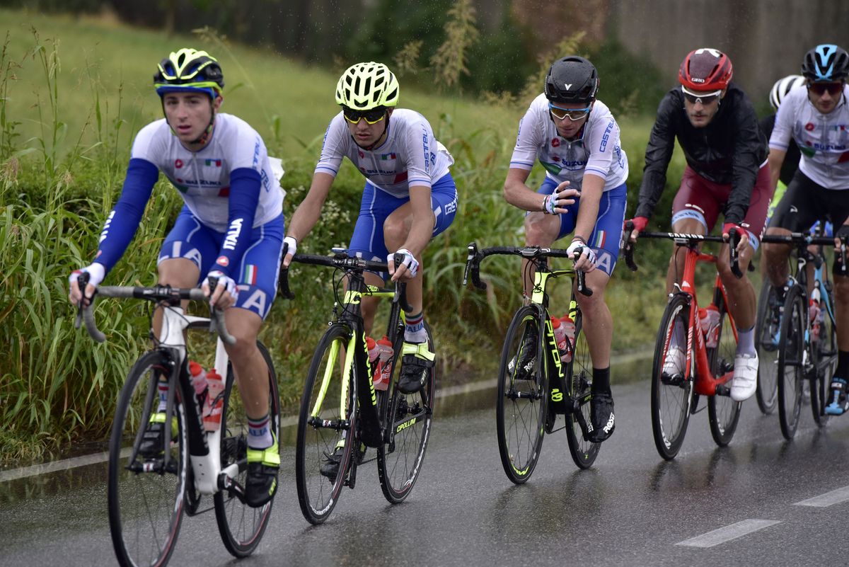 Team Italy sets the pace on a rainy start to the race