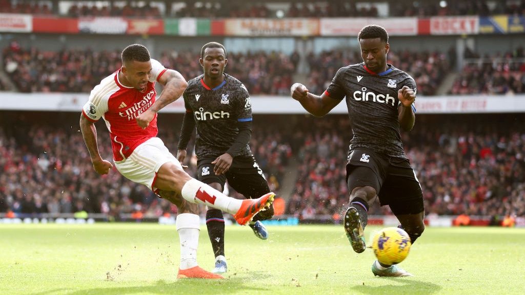 Gabriel Jesus of Arsenal takes a shot past Marc Guehi of Crystal Palace during the Premier League match between Arsenal FC and Crystal Palace at Emirates Stadium on January 20, 2024 in London, England.