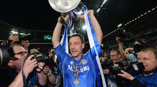 John Terry celebrates with the Champions League trophy after Chelsea&#039;s win over Bayern Munich in the 2012 final.