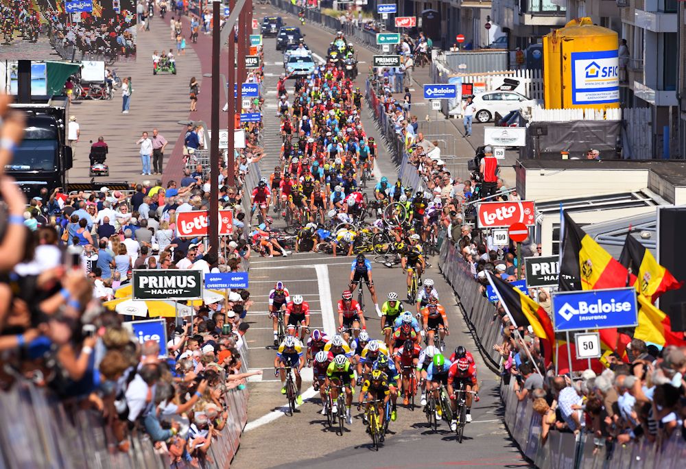 Riders are involved in a pile-up near the end of stage 1 at the Belgium Tour