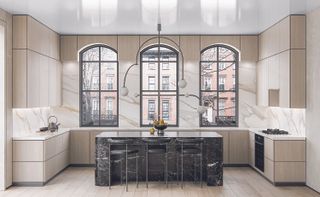 kitchen with a central island and big pendant light