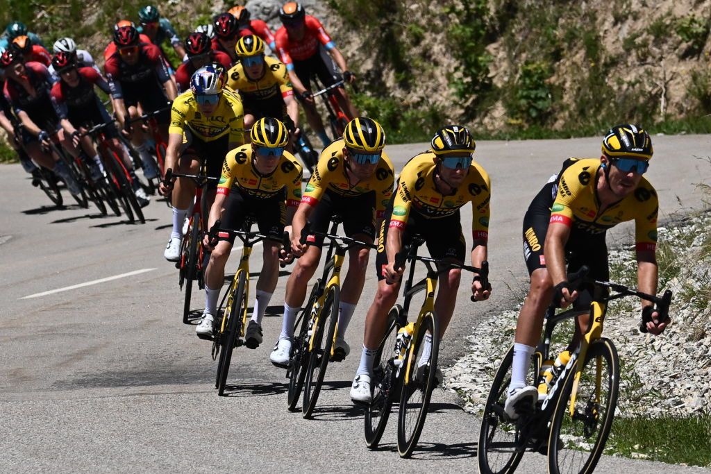 The pack rides during the sixth stage of the 74th edition of the Criterium du Dauphine cycling race 1965 km between Rives and Gap central eastern France on June 10 2022 Photo by Marco BERTORELLO AFP Photo by MARCO BERTORELLOAFP via Getty Images