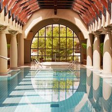 Shot of an indoor swimming pool at a health spa