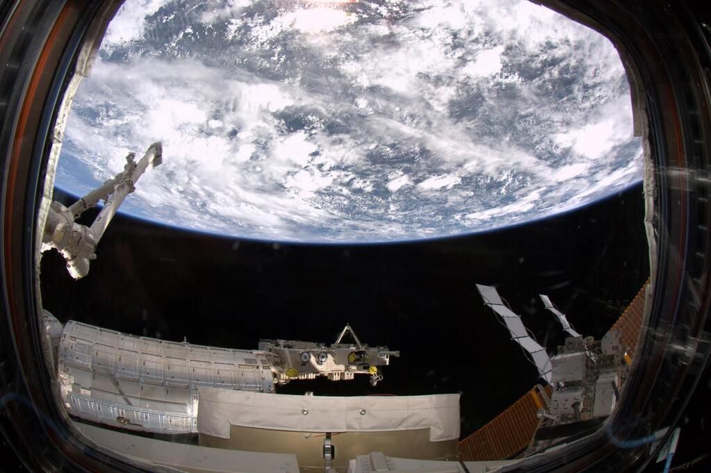 Earth Seen Through the International Space Station&#039;s Cupola