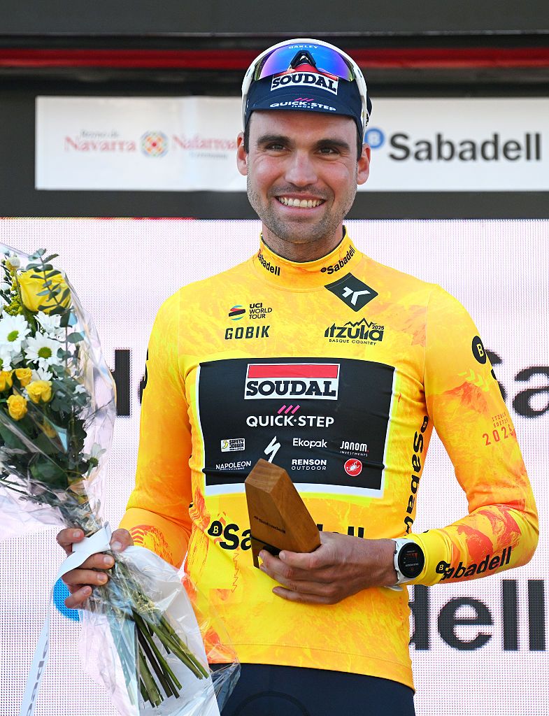 VITORIAGASTEIZ SPAIN APRIL 07 Maximilian Schachmann of Germany and Team Soudal QuickStep celebrates at podium as Yellow leader jersey winner during the 64th Itzulia Basque Country 2025 Stage 1 a 165km individual time trial from VitoriaGasteiz to BaskoniaAlaves UCIWT on April 07 2025 in VitoriaGasteiz Spain Photo by Tim de WaeleGetty Images
