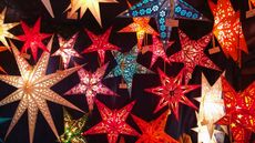 star shaped lanterns in various colours by getty images