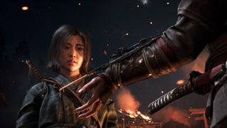 A screenshot showing Naoe looking at the hidden blade in Assassin's Creed Shadows