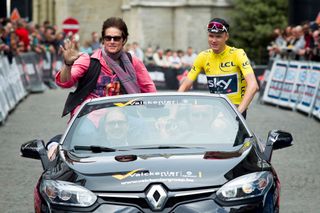 Chris Froome greets the fans with soap opera star Ronn Moss