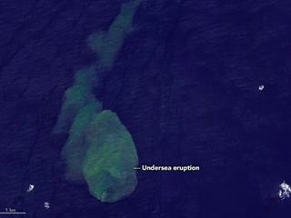 A plume of discolored water surrounds the Kavachi Volcano in the Solomon Islands in this satellite image taken May 14, 2022.