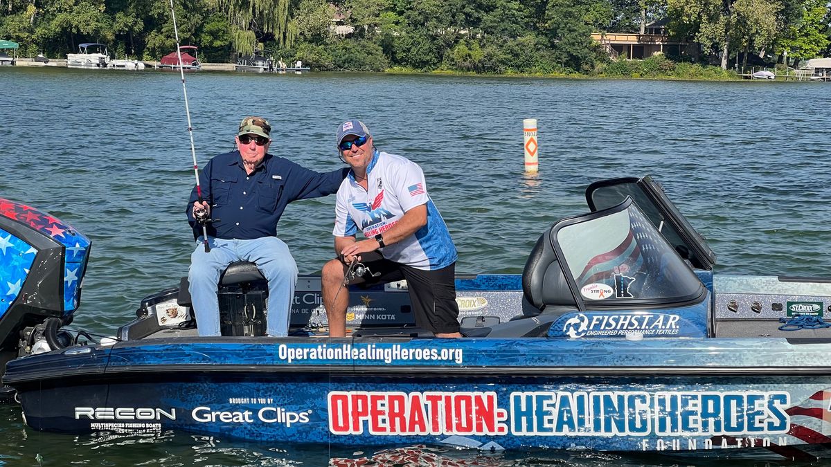 Two veterans on a boat for a The Discovery Channel show using Shure wireless audio soultions.