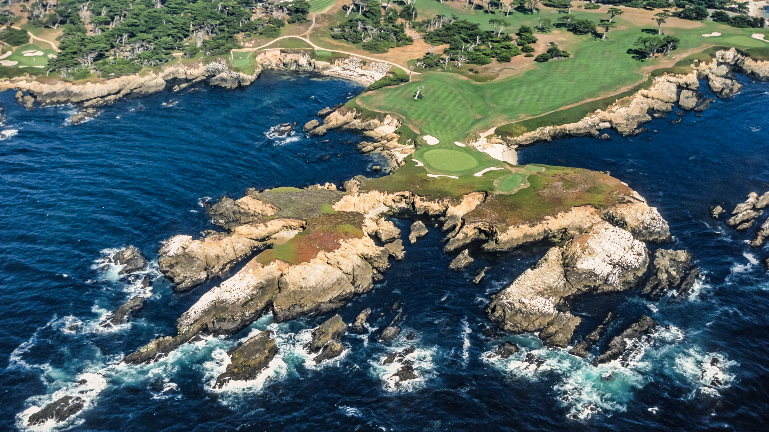 An aerial view of the 15th, 16th and 17th holes at Cypress Point Club in 1997