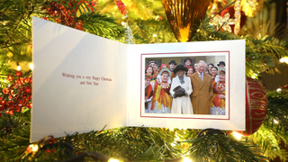 In this handout provided by Clarence House on December 10, 2016, shows The Prince of Wales and Duchess of Cornwall's 2016 Christmas card on a Christmas tree in Clarence House, London. The picture on the card was taken by Chris Jackson of Getty Images, showing the royal couple during their tour of Croatia where they met local performers wearing traditional dress in Tvrda, the old town of the city of Osijek