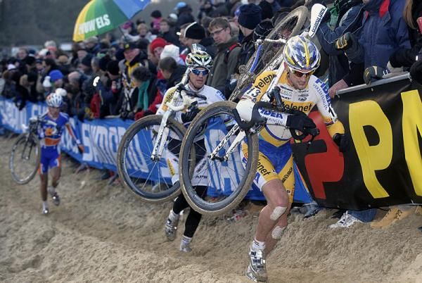 Bart Wellens leads Telenet - Fidea teammate Zdenek Stybar on a run-up.