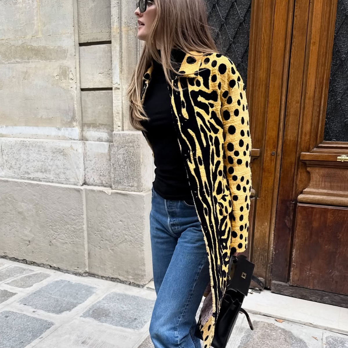 woman wearing medium wash cropped jeans trend