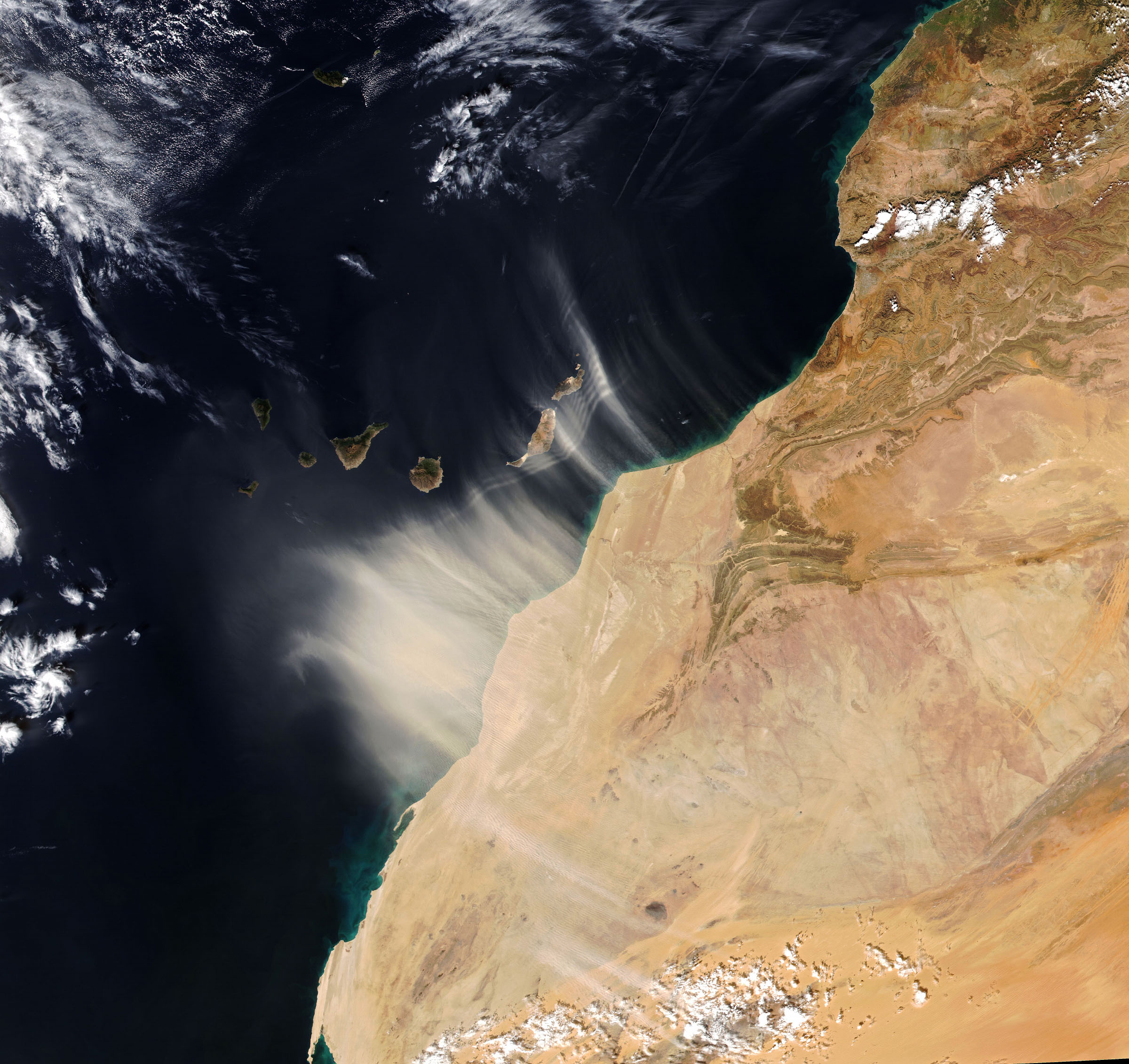 On Jan. 14, 2022, strong seasonal winds carried dust from northwest Africa over the Canary Islands, causing visibility to drop and air quality to decline. EMIT will measure the mineral composition of dust in Earth's arid regions, creating a map that could improve understanding of how dust affects people and communities.