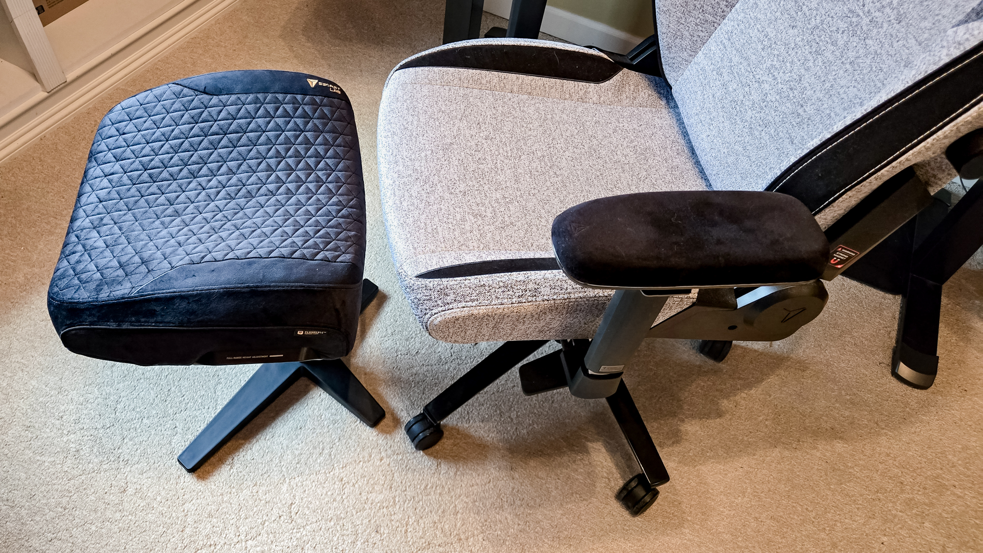 A close-up shot of the Secretlab Otto Legrest in front of a gaming chair