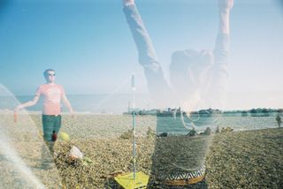 Couple playing swingball