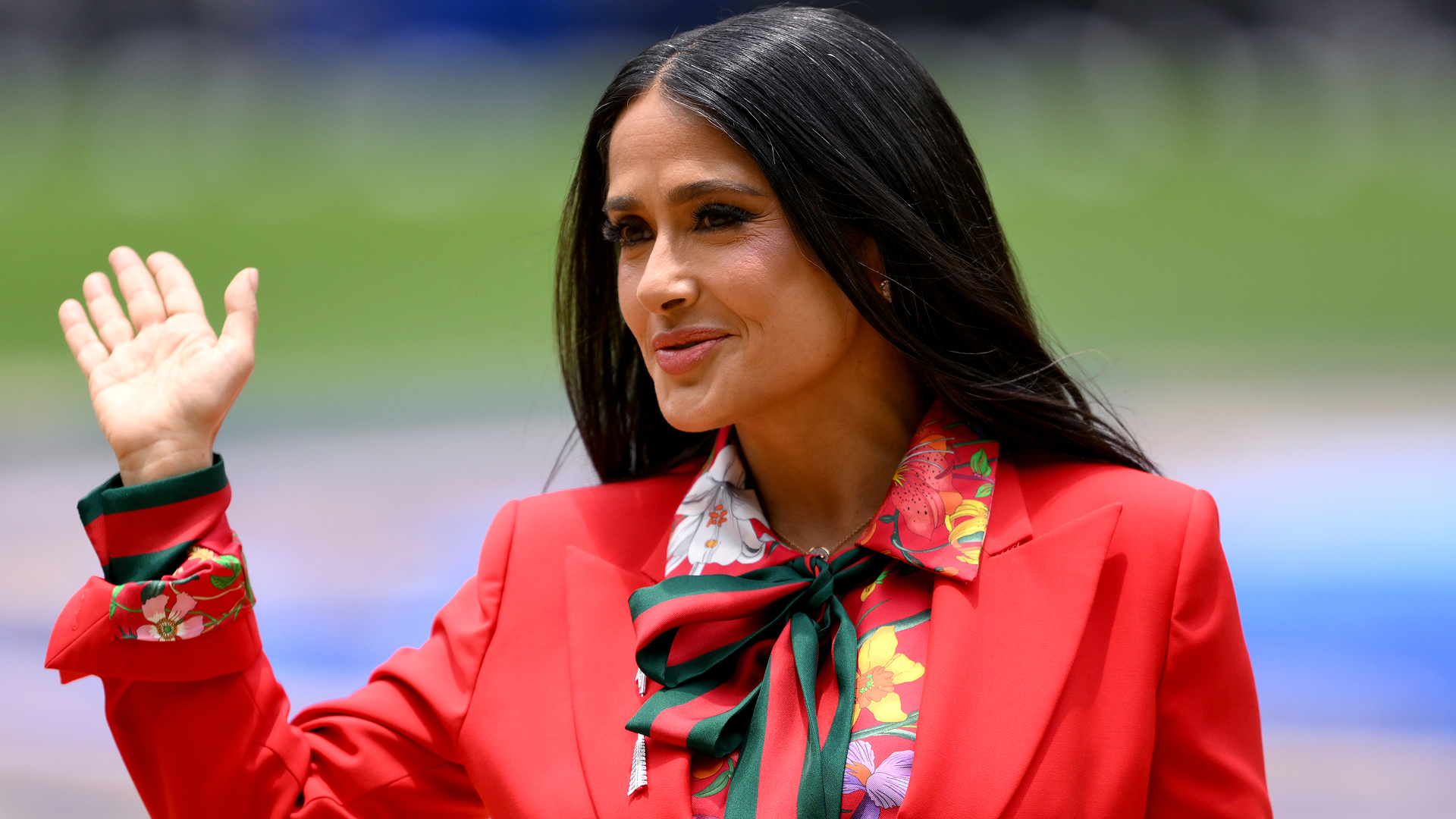 Salma Hayek opened the 2026 World Cup in a custom strawberry red suit from Gucci