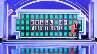 wheel of fortune board pat sajak vanna white