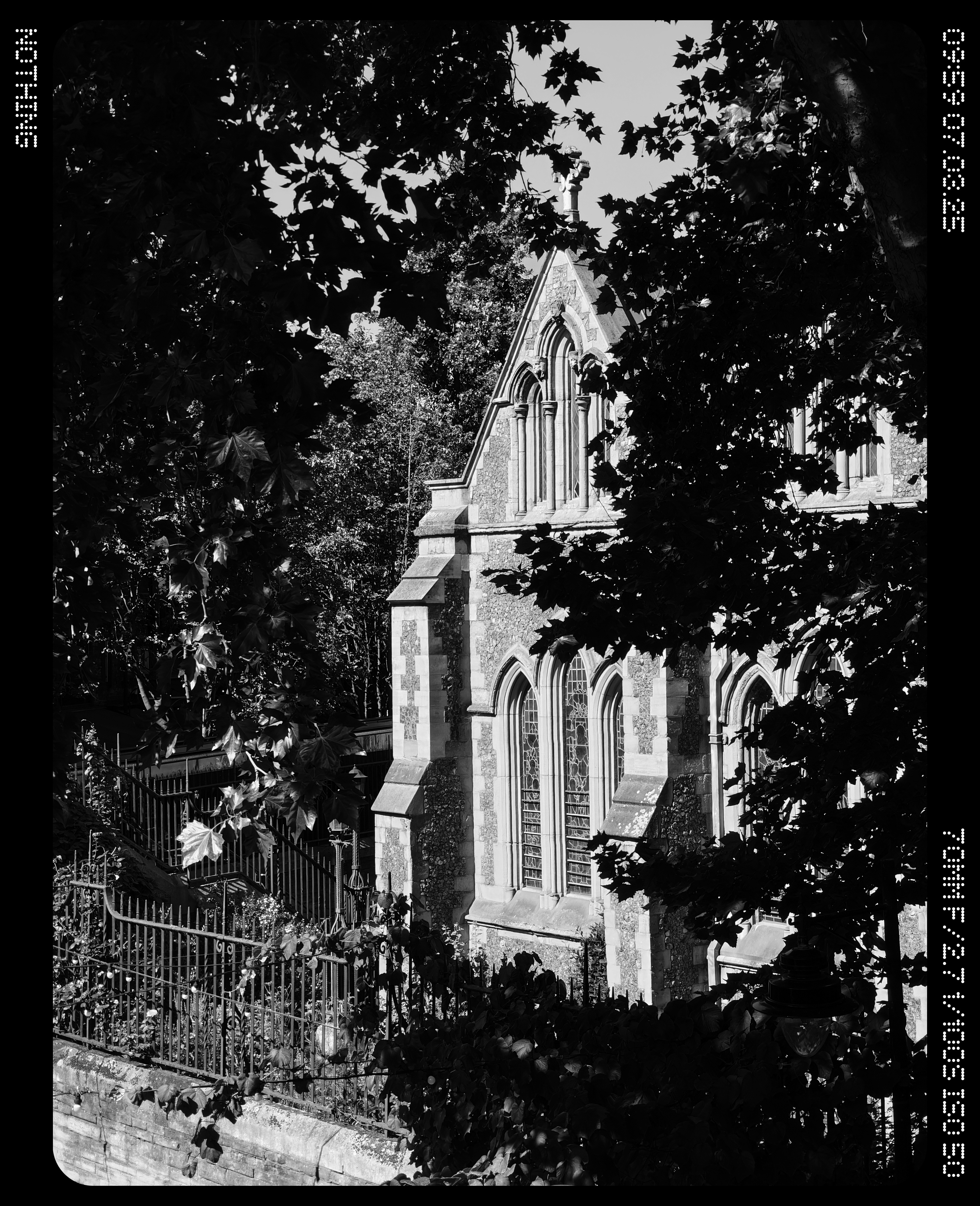 An old church seen through some trees