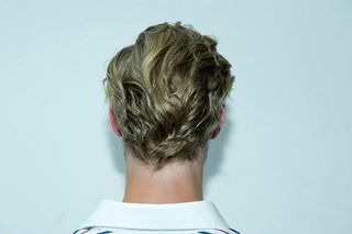 Back of the head of a blond male model