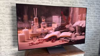 Samsung S90F showing image of cluttered table