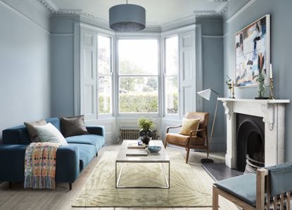 how do you decorate using different shades of the same color; blue living room by Mylands