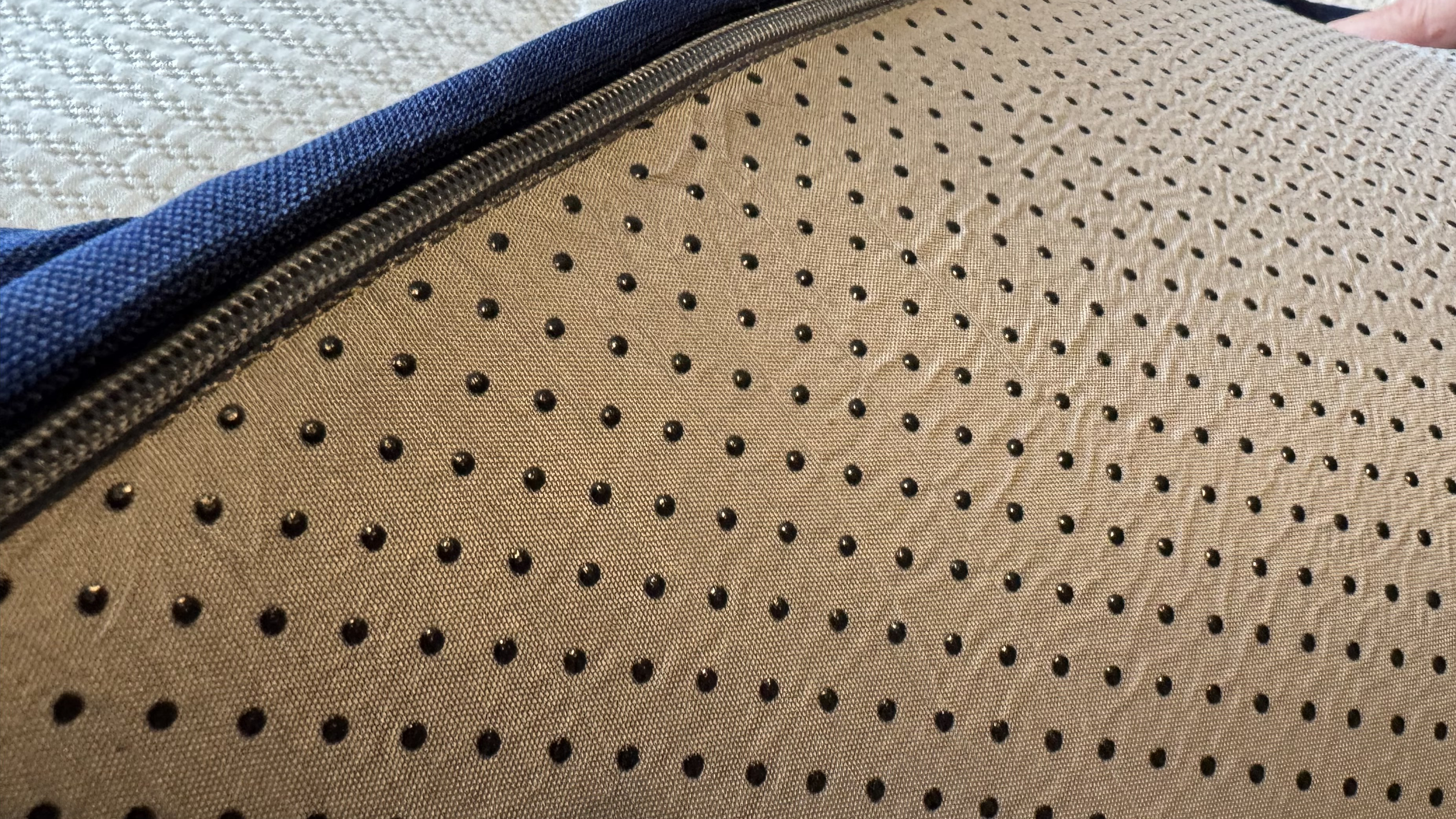 A close up of the underside of the Nectar topper